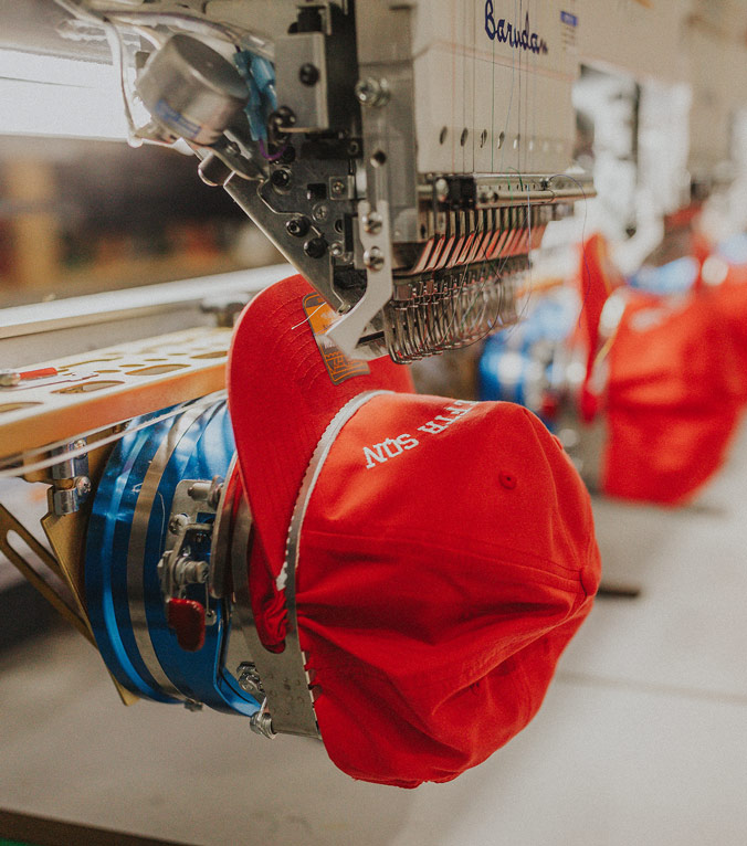 Image displaying screenprint and embroidery in action