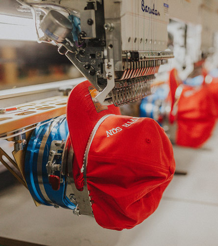 Image displaying screenprint and embroidery in action