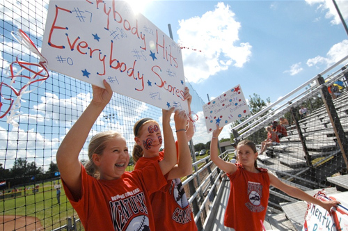 BG East fans cheer for their 16-6 win over Indiana during the final day of pool play in the 2008 Little League Great Lakes Regional Tournament in Indianapolis. Photograph by Joe Imel, Bowling Green Daily News