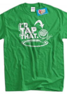 Golf ball at edge of hole on T shirt