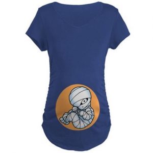 Picture of curled up baby mummy on abdomen of maternity shirt