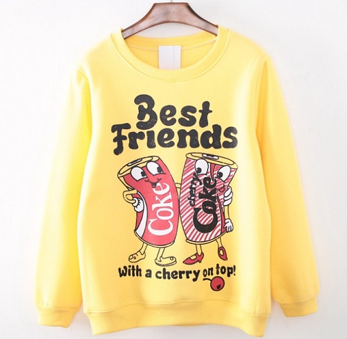 Sweater. Coke and Cherry Coke cans with hands around shoulders. "Best Friends With A Cherry On Top."