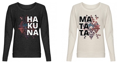 matching sweaters, one says "ha ku na" the other says "ma ta ta'