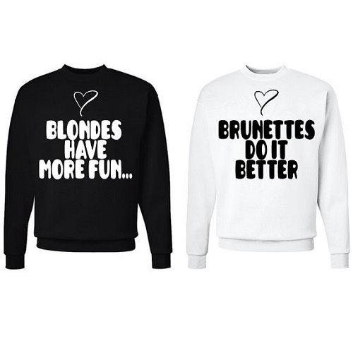 matching sweaters say "blondes have more fun" and "brunettes do it better"
