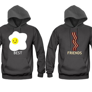 matching hoodies. Drawing of fried egg: "Best." Drawing of bacon: "Friends."