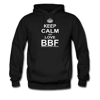 Sweater says "Keep calm and love BBF (Brunette best friend)"