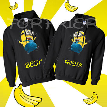 Matching sweaters with Despicable Me minions. One says "best" the other "friend"