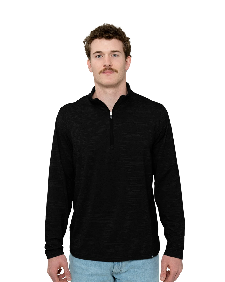 Model wearing a TM1MW452 TravisMathew Crestview 1/4-Zip