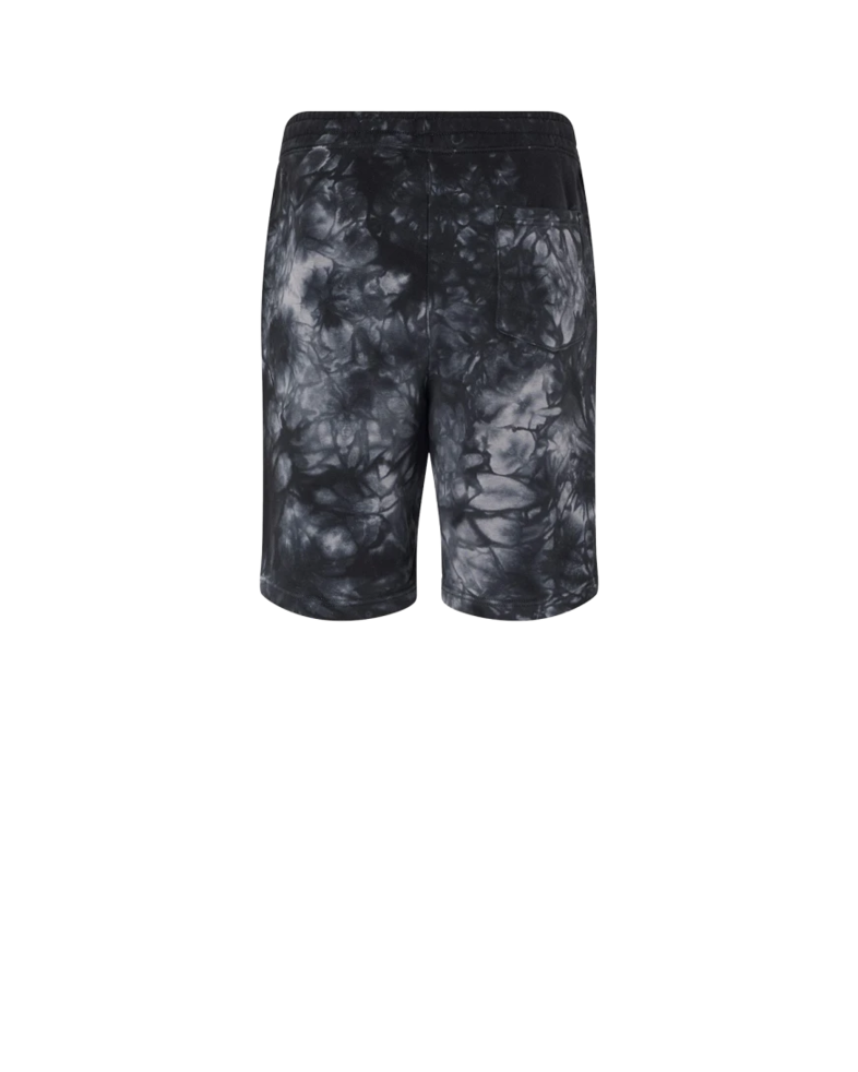 Image of a model wearing a PRM50STTD Independent Trading Co. Tie-Dyed Fleece Shorts
