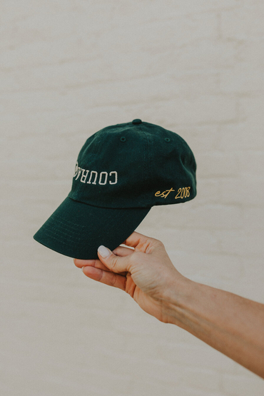 Customer wearing a VC300 Valucap Bio-Washed Cap