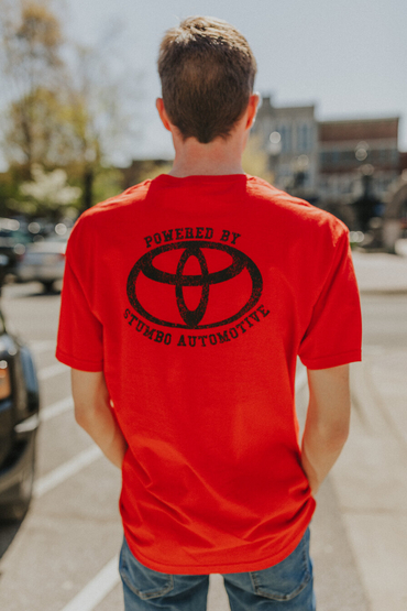 Customer wearing a 64000 Gildan SoftStyle Tee