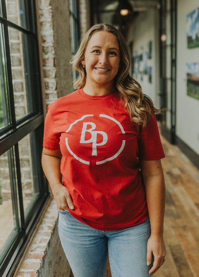 Customer wearing a 64000 Gildan SoftStyle Tee