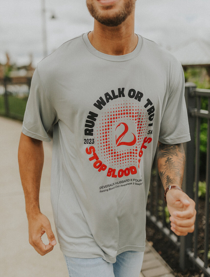 Customer wearing a ST350 Sport-Tek Competitor Tee