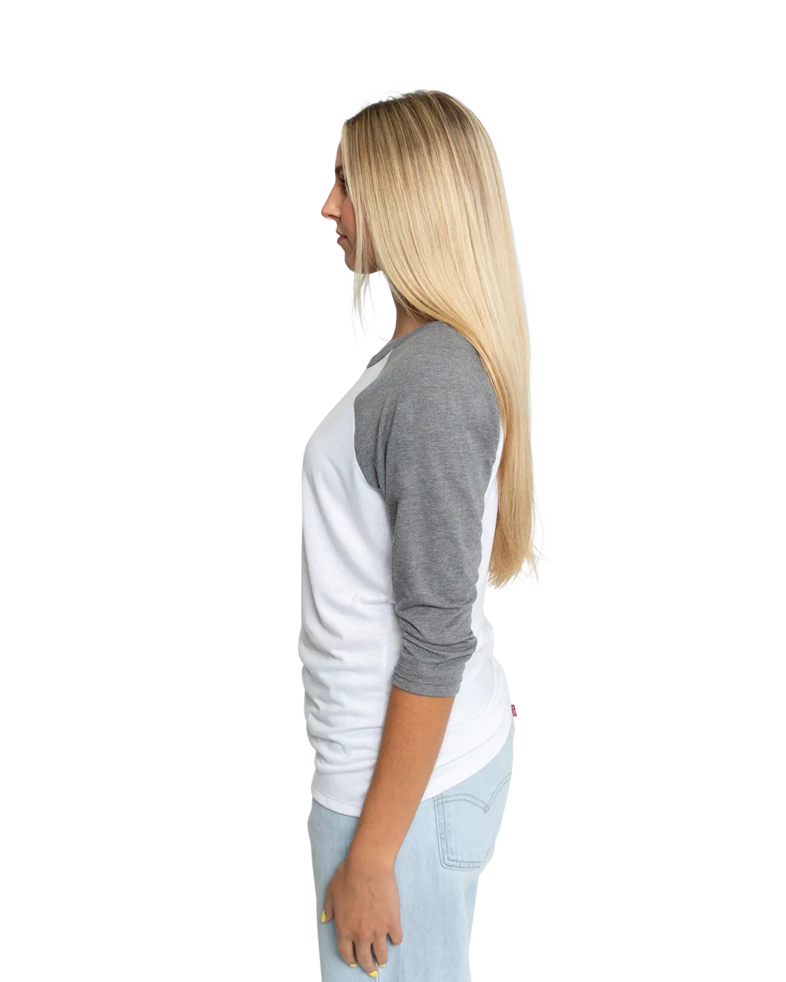 Image of a model wearing a DM136L District Ladies Tri-Blend Baseball Raglan