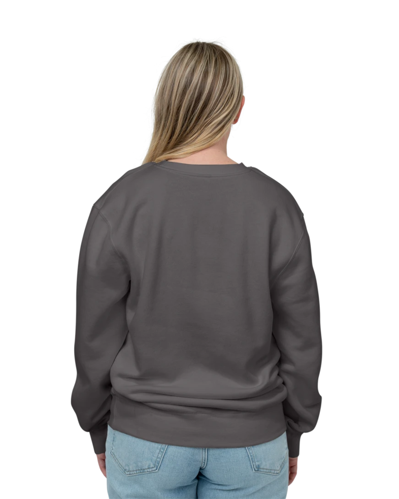 Image of a model wearing a PRM3500 Independent Trading Co. Unisex Midweight Pigment-Dyed Crewneck Sweatshirt