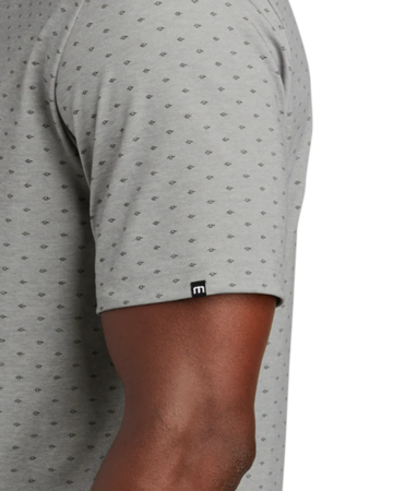 Closeup of a Customizable TM1MY403 TravisMathew Oceanside Geo Polo