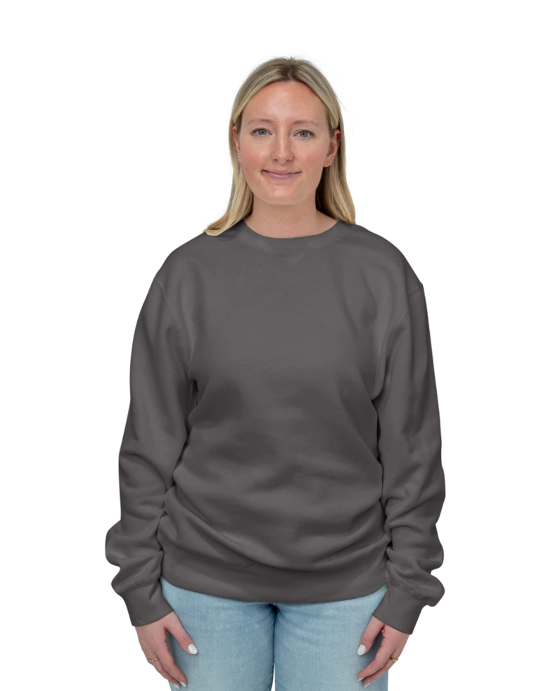 Image of a model wearing a PRM3500 Independent Trading Co. Unisex Midweight Pigment-Dyed Crewneck Sweatshirt