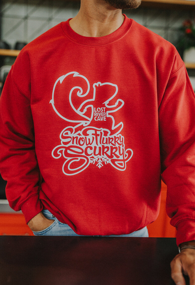 Customer wearing a 18000 Gildan Crewneck Sweatshirt