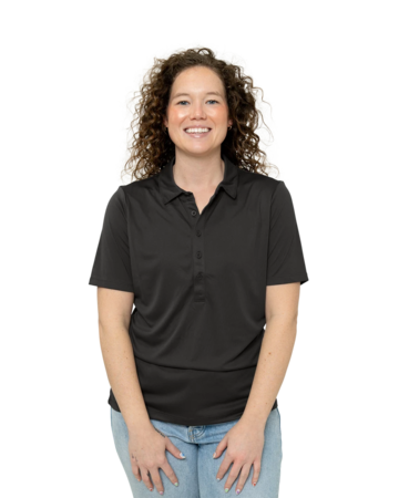 Model wearing a LST520 Sport-Tek Ladies Posi-UV Pro Polo