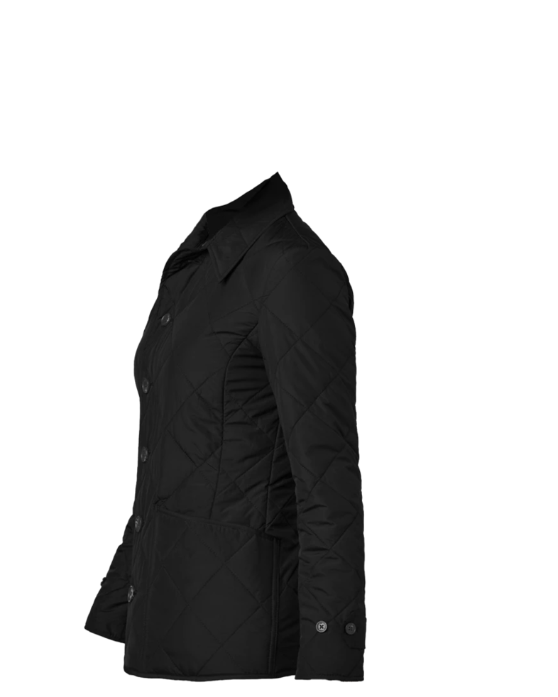 Image of a model wearing a BB18601 Brooks Brothers® Women’s Quilted Jacket