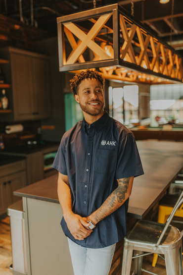 Customer wearing a S508 Port Authority Short Sleeve Easy Care Shirt