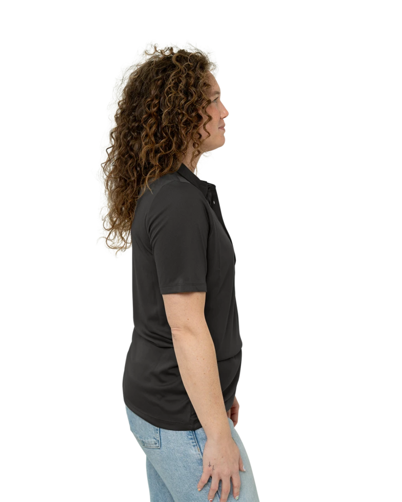 Image of a model wearing a LST520 Sport-Tek Ladies Posi-UV Pro Polo