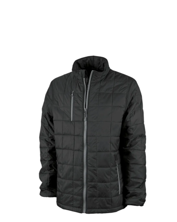 Model wearing a 9540 Charles River Men's Lithium Quilted Jacket