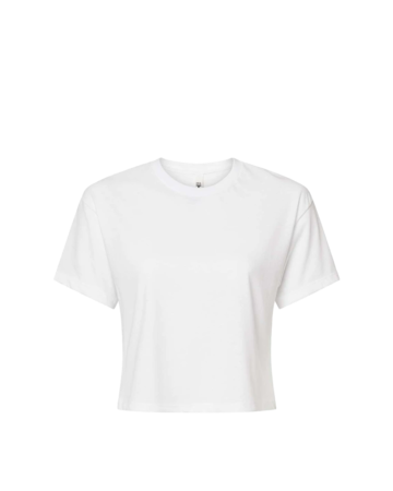 Model wearing a 1580 Next Level Women's Ideal Crop Tee