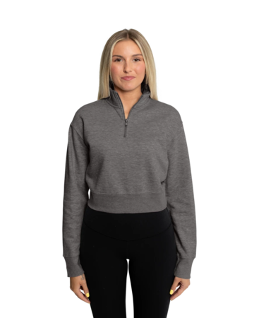 Model wearing a DT6111 District® Women’s V.I.T.™ Fleece 1/2-Zip