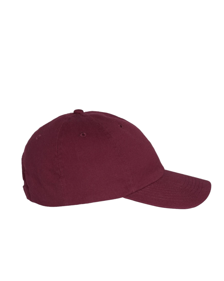 Image of a model wearing a VC300 Valucap Bio-Washed Cap