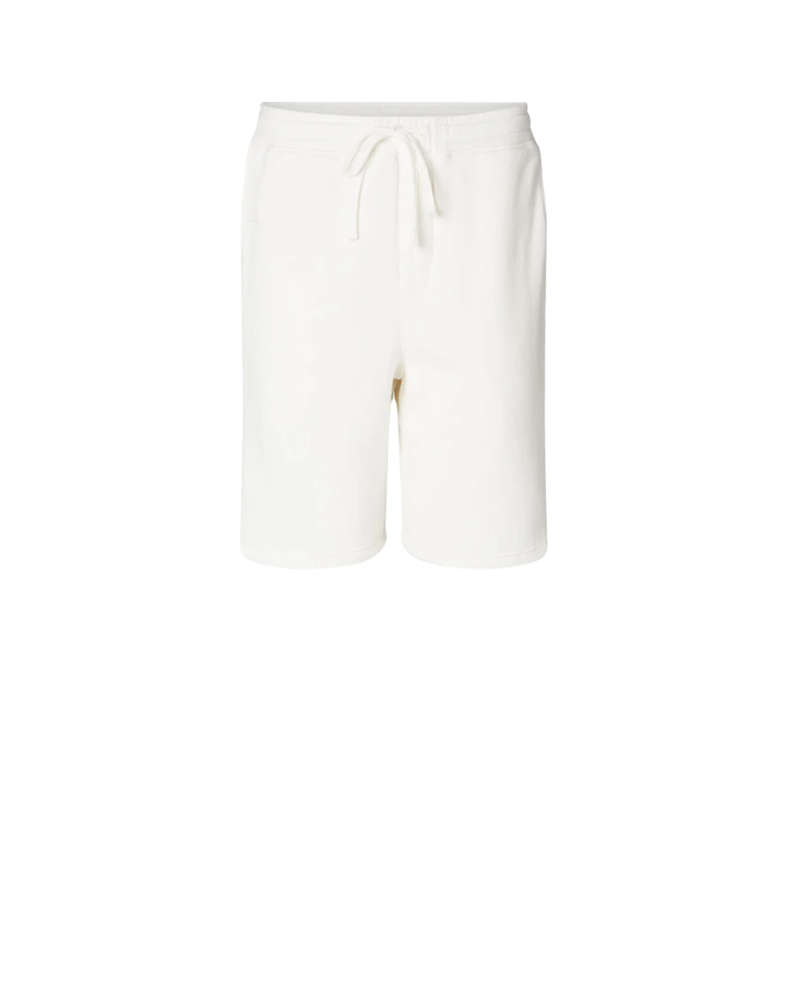 Image of a model wearing a PRM50STPD Independent Trading Co. Pigment-Dyed Fleece Shorts