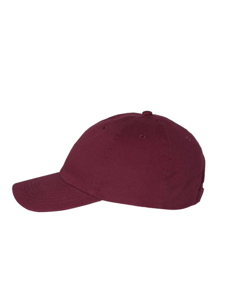 Image of a model wearing a VC300 Valucap Bio-Washed Cap