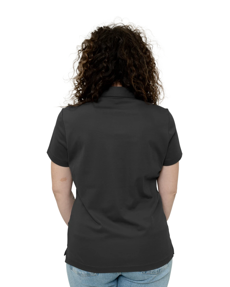 Image of a model wearing a TM1WW001 TravisMathew Ladies Oceanside Solid Polo