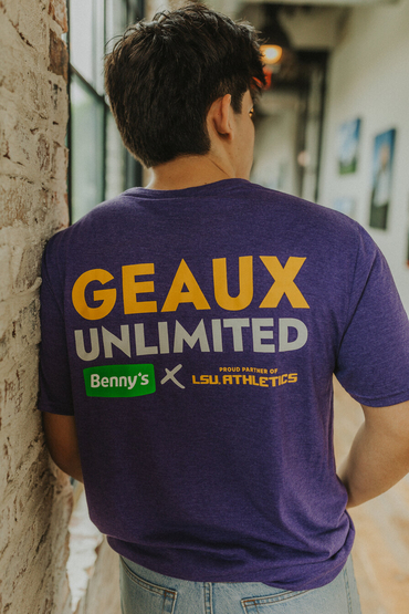 Customer wearing a DM130 District Unisex Perfect Tri-Blend Crew Tee