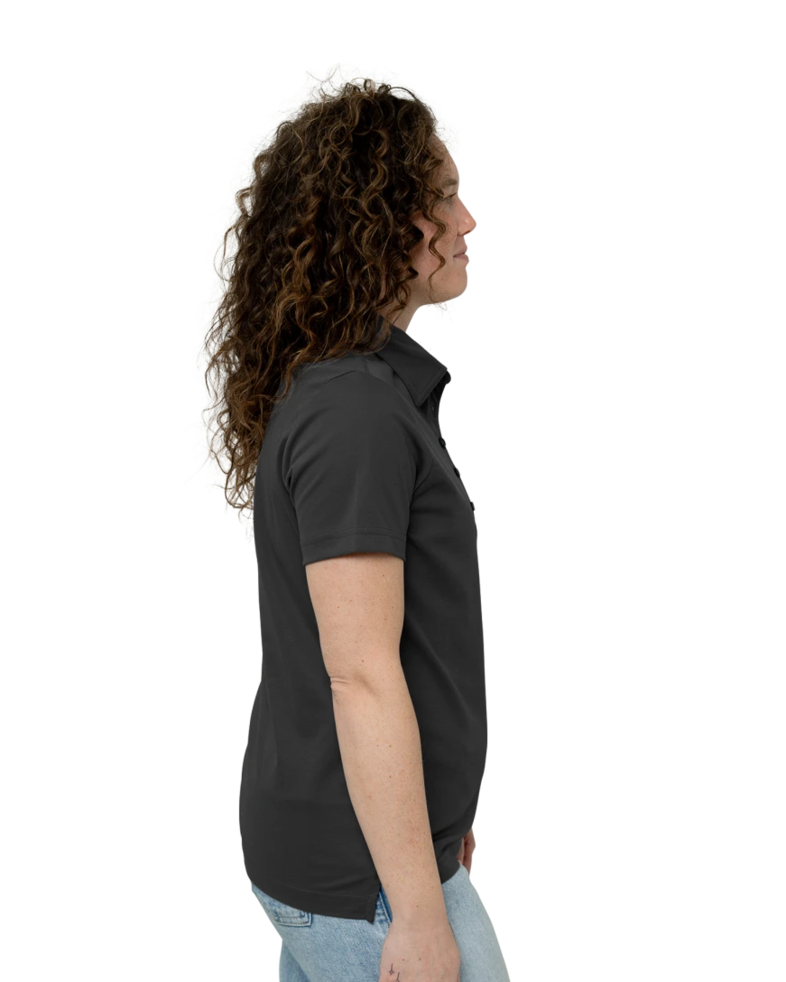 Image of a model wearing a TM1WW001 TravisMathew Ladies Oceanside Solid Polo