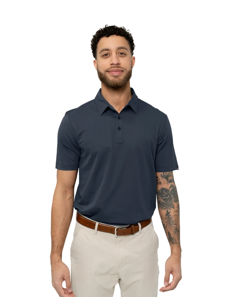 Image of a model wearing a TM1MU411 TravisMathew Oceanside Solid Polo