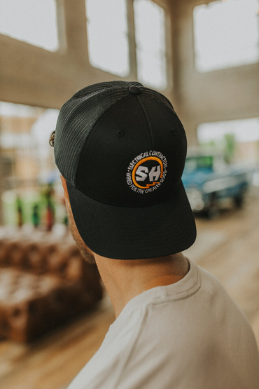 Customer wearing a 112 Richardson Snapback Trucker Cap