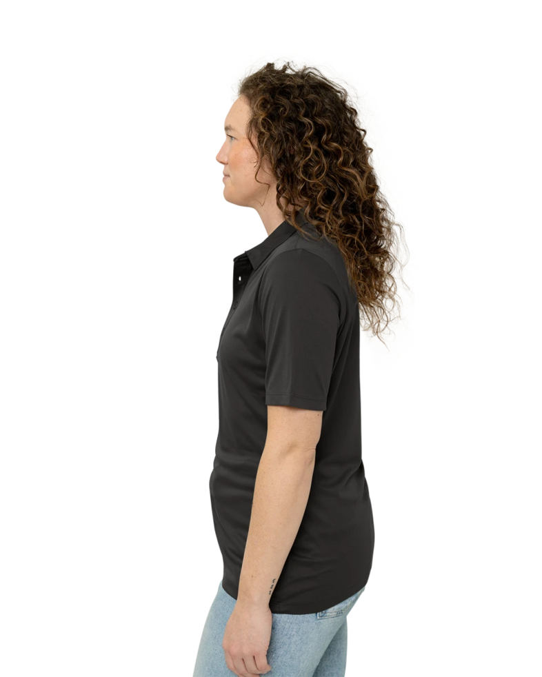 Image of a model wearing a LST520 Sport-Tek Ladies Posi-UV Pro Polo