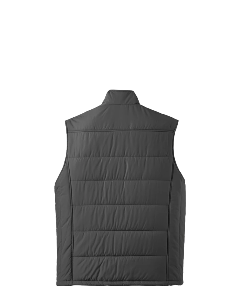 Image of a model wearing a J709 Port Authority Puffy Vest