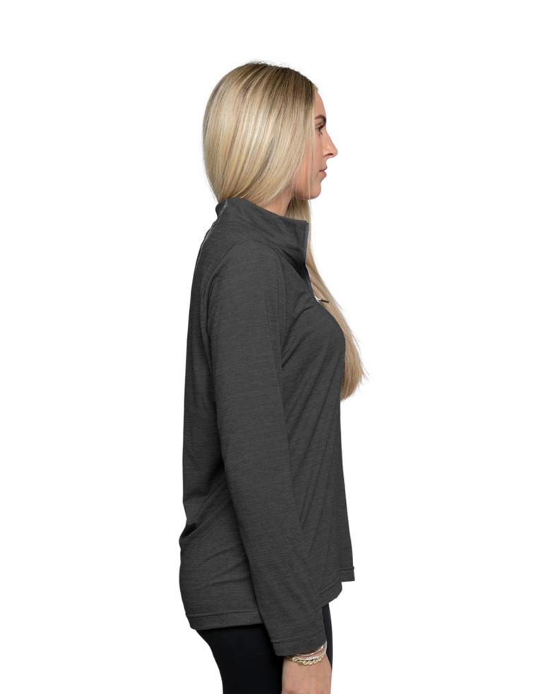 Image of a model wearing a TM1WW003 TravisMathew Ladies Crestview 1/4-Zip