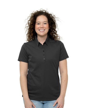 Model wearing a TM1WW001 TravisMathew Ladies Oceanside Solid Polo