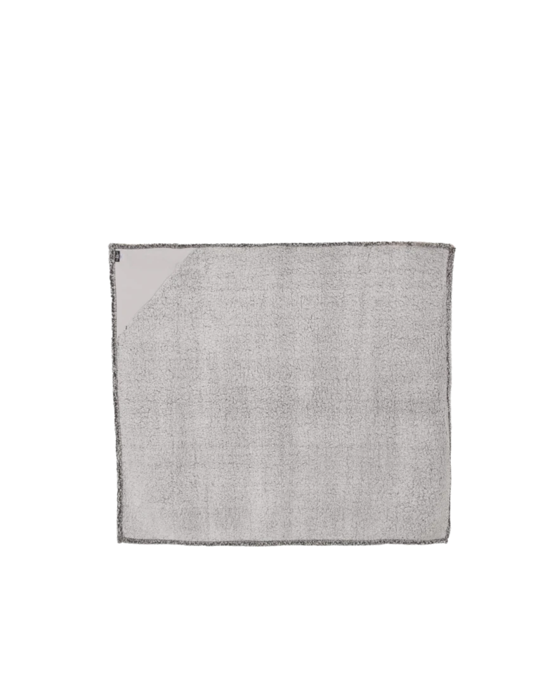 Image of a model wearing a Q21 Boxercraft Sherpa Blanket