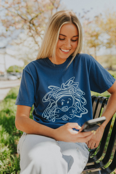 Customer wearing a CC1717 Comfort Colors Pigment Dyed Short Sleeve Shirt