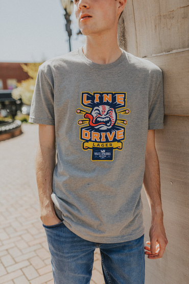 Customer wearing a NL6210 Next Level Unisex CVC Crew Tee