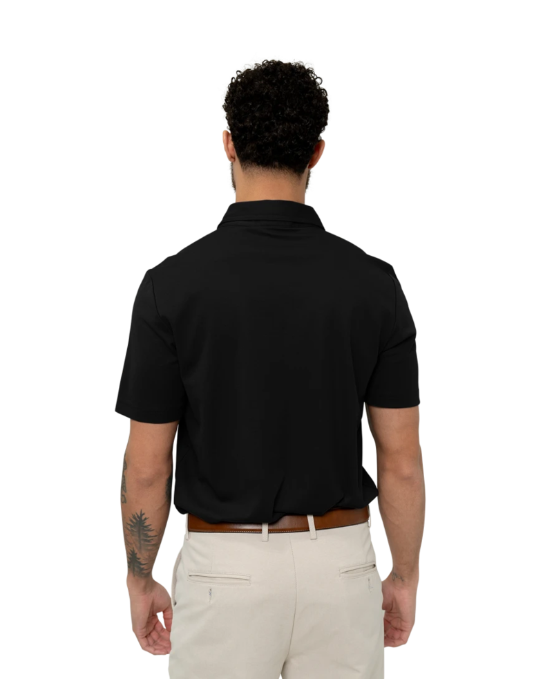 Image of a model wearing a TM1MU411 TravisMathew Oceanside Solid Polo