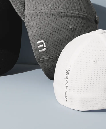 Closeup of a TM1MU426 TravisMathew Rad Flexback Cap