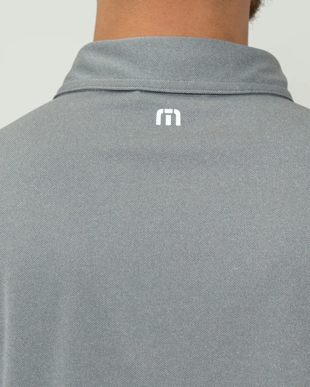 Closeup of a TM1MU410 TravisMathew Coto Performance Polo