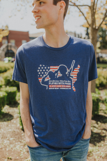 Customer wearing a 3413 Bella + Canvas Tri-Blend Tee