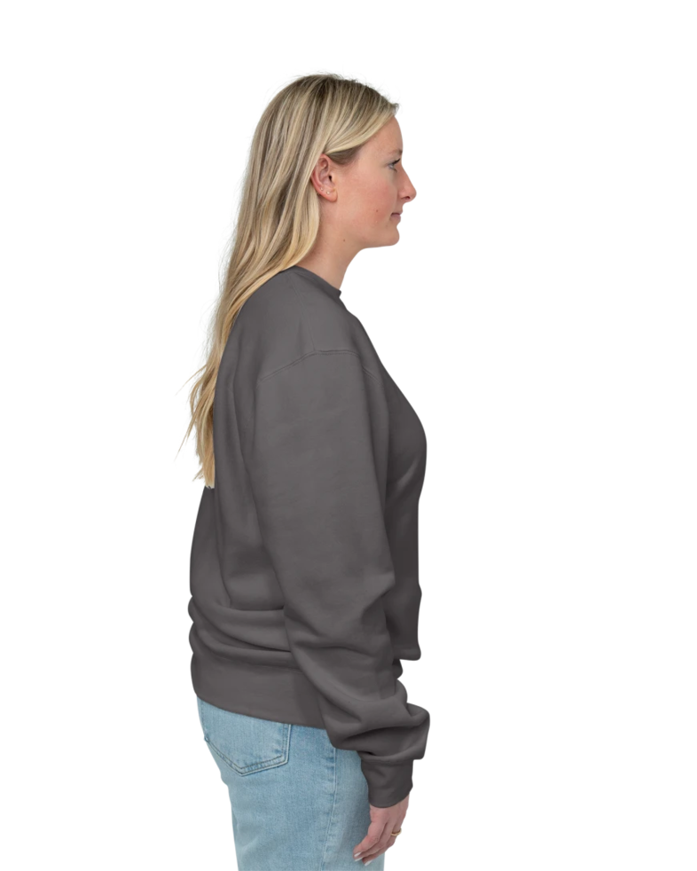 Image of a model wearing a PRM3500 Independent Trading Co. Unisex Midweight Pigment-Dyed Crewneck Sweatshirt