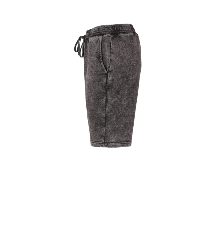 Image of a model wearing a PRM50STMW Independent Trading Co. Mineral Wash Fleece Shorts